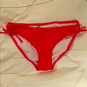 Coral side tie bikini bottoms